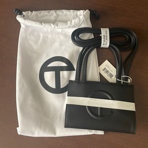 Brand new! Small black shopping bag.